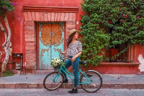 Travel blogger riding a bike in Mexico. Who is Backpacking Brunette? I'm Alex, the brunette backpacker behind this blog.